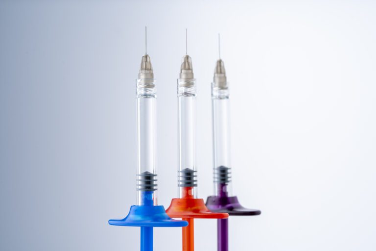 Syringes of cosmetic injectable filler